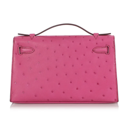 Vivid Fuchsia Pink Speckled Slim Rectangular Mini Clutch With Sleek Cool Silvery Twist Lock Hardware And Delicate Curved Top Carry Grip