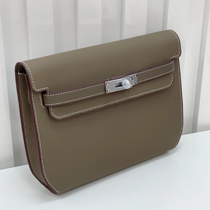 Muted Elephant Grey Textured Flat Rectangular Wrist Pouch With Sleek Silvery Twist Lock Hardware And Delicate Contrast Edge Stitching